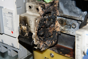 Burned circuit breaker. PC Electric serving Portland OR and Beaverton OR talks about why your circuit breaker box may smell like it's burning.
